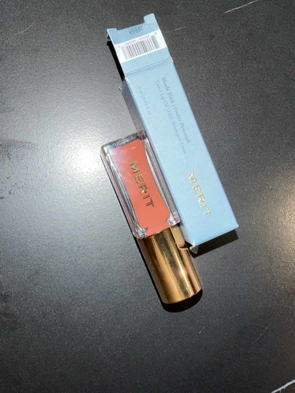 Merit - Shade taupe Tinted Lip Oil — taupe neutral Peachy Coral Pin